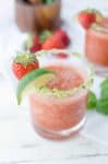 A fresh twist on a classic! Frozen Strawberry Basil Margaritas with Basil-Salt rim. Naturally sweetened!