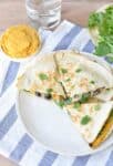 Sweet Potato Hummus Quesadilla! Homemade sweet potato hummus with black beans, arugula, and pepperjack cheese. Easy dinner that's ready in 10 minutes. | www.delishknowledge.com