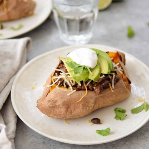 Taco Stuffed Sweet Potatoes 7 Taco Stuffed Sweet Potatoes! If You Are Looking For A Quick And Healthy Vegetarian Dinner, This Is It. Sweet Potatoes Stuffed With A Spicy Black Bean Filling, Cheese, Avocado, Cilantro And Your Favorite Toppings. Gluten-Free | Www.delishknowledge.com