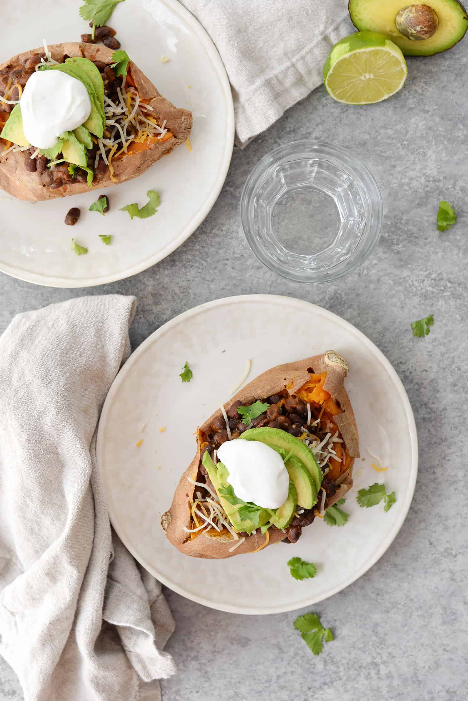 Taco Stuffed Sweet Potatoes! If You Are Looking For A Quick And Healthy Vegetarian Dinner, This Is It. Sweet Potatoes Stuffed With A Spicy Black Bean Filling, Cheese, Avocado, Cilantro And Your Favorite Toppings. Gluten-Free | Www.delishknowledge.com