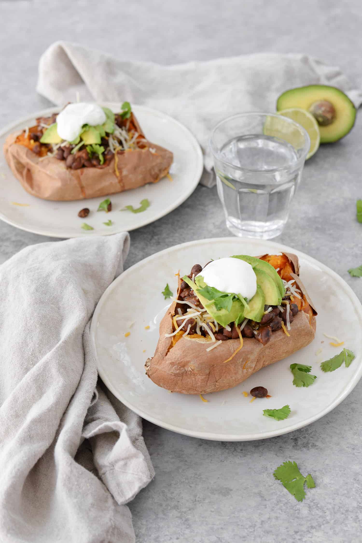 Taco Stuffed Sweet Potatoes! If You Are Looking For A Quick And Healthy Vegetarian Dinner, This Is It. Sweet Potatoes Stuffed With A Spicy Black Bean Filling, Cheese, Avocado, Cilantro And Your Favorite Toppings. Gluten-Free | Www.delishknowledge.com