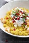 Close-up photo of tandoori cauliflower and turmeric basmati rice.