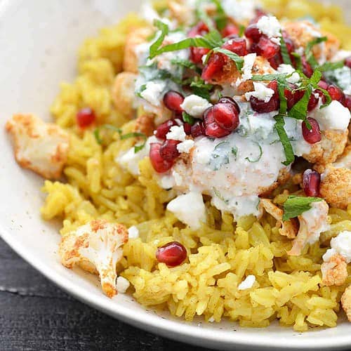 Vegetarian Tandoori Cauliflower Bowl 6 Close-Up Photo Of Tandoori Cauliflower And Turmeric Basmati Rice.