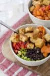 Thai Coconut Buddha Bowls! The best thai tofu with black rice, edamame, carrots, vegetables and a peanut-thai sauce! Vegan and Gluten-Free | www.delishknowledge.com