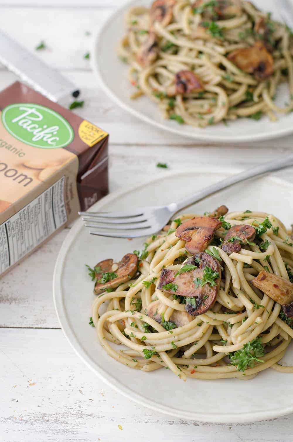 The BEST creamy mushroom pasta! Made with a secret ingredient, this pasta is packed with savory umami flavor and ready in just 20 minutes! Save this for weeknight dinners. | www.delishknowledge.com