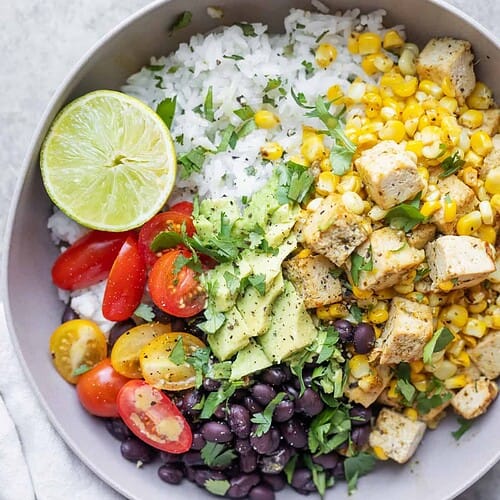 Tofu Rice Bowls with Black Beans and Corn Salad 8 Vegan Rice Bowl With Beans, Cilantro Lime Tofu, Corn And A Lime Wedge