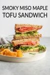 tofu sandwich with arugula, avocado and tomato