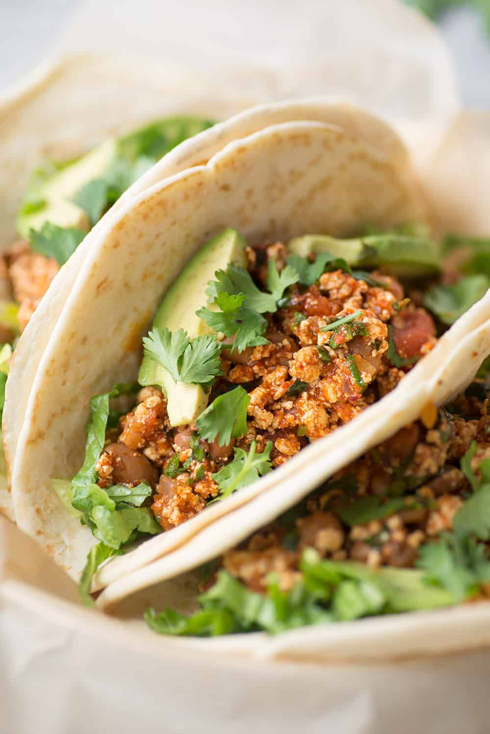 Copycat Chipotle Tofu Sofritas Recipe (Vegan) 4 Side Image Of The Tacos With The Tofu Sofritas Filling And Garnishes