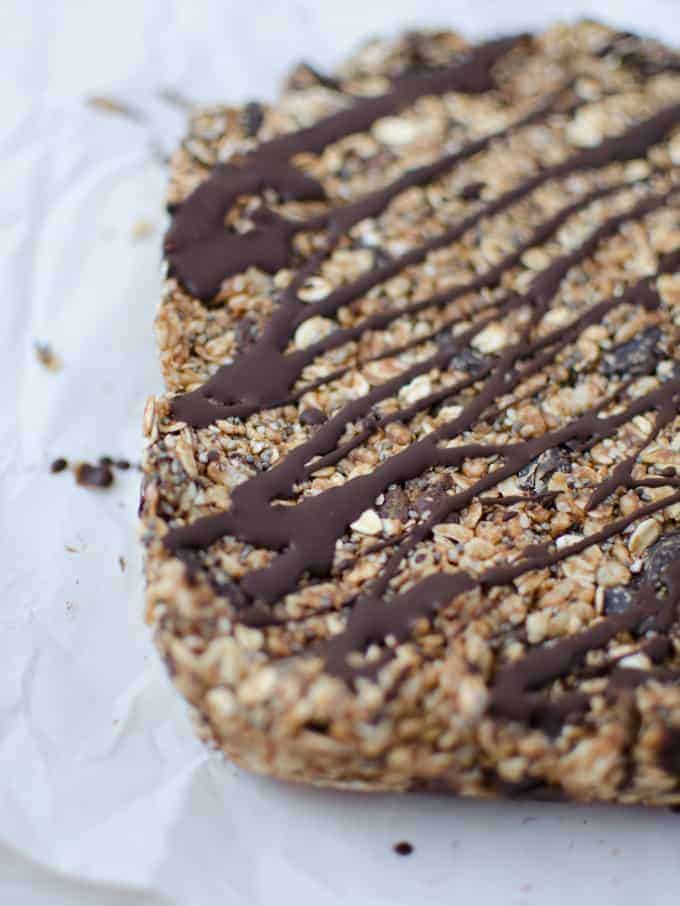 Works Like A Health Bar, Tastes Like A Candy Bar! Layers Of Oats, Nuts, Seeds And Chocolate! Topped With A Dairy-Free Magic-Shell Chocolate Topping. These Bars Are Both Gluten-Free And Vegan!