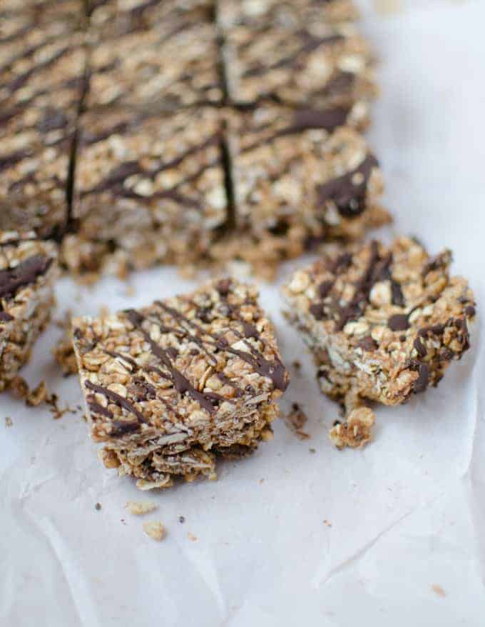 Works Like A Health Bar, Tastes Like A Candy Bar! Layers Of Oats, Nuts, Seeds And Chocolate! Topped With A Dairy-Free Magic-Shell Chocolate Topping. These Bars Are Both Gluten-Free And Vegan!