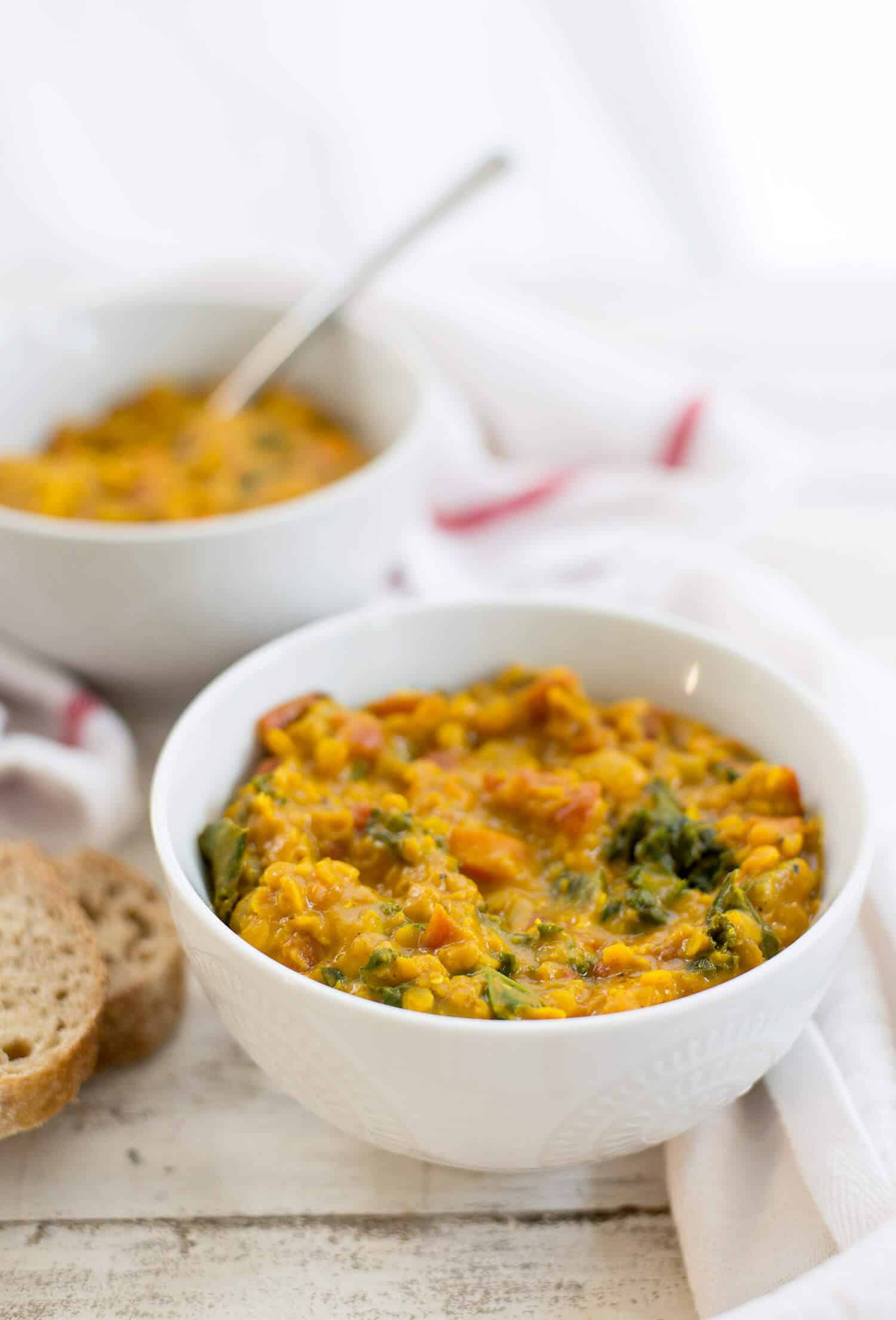 Turmeric Red Lentil Soup! Creamy, thick lentil stew with turmeric, vegetables and kale. Vegan and Gluten-Free. | www.delishknowledge.com