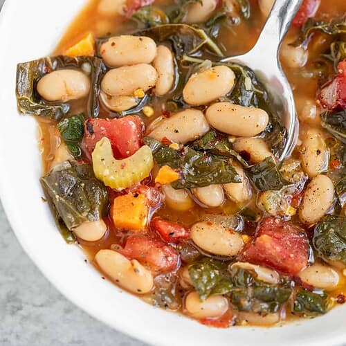 Tuscan White Bean Soup 11 White Beans With Kale And Tomatoes In A Bowl