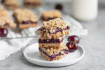fresh cherry pie bars on a plate