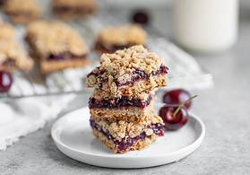 fresh cherry pie bars on a plate