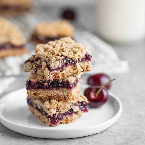 Fresh Cherry Pie Bars On A Plate
