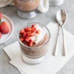 vegan pudding with spoons and chocolate