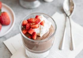 vegan pudding with spoons and chocolate