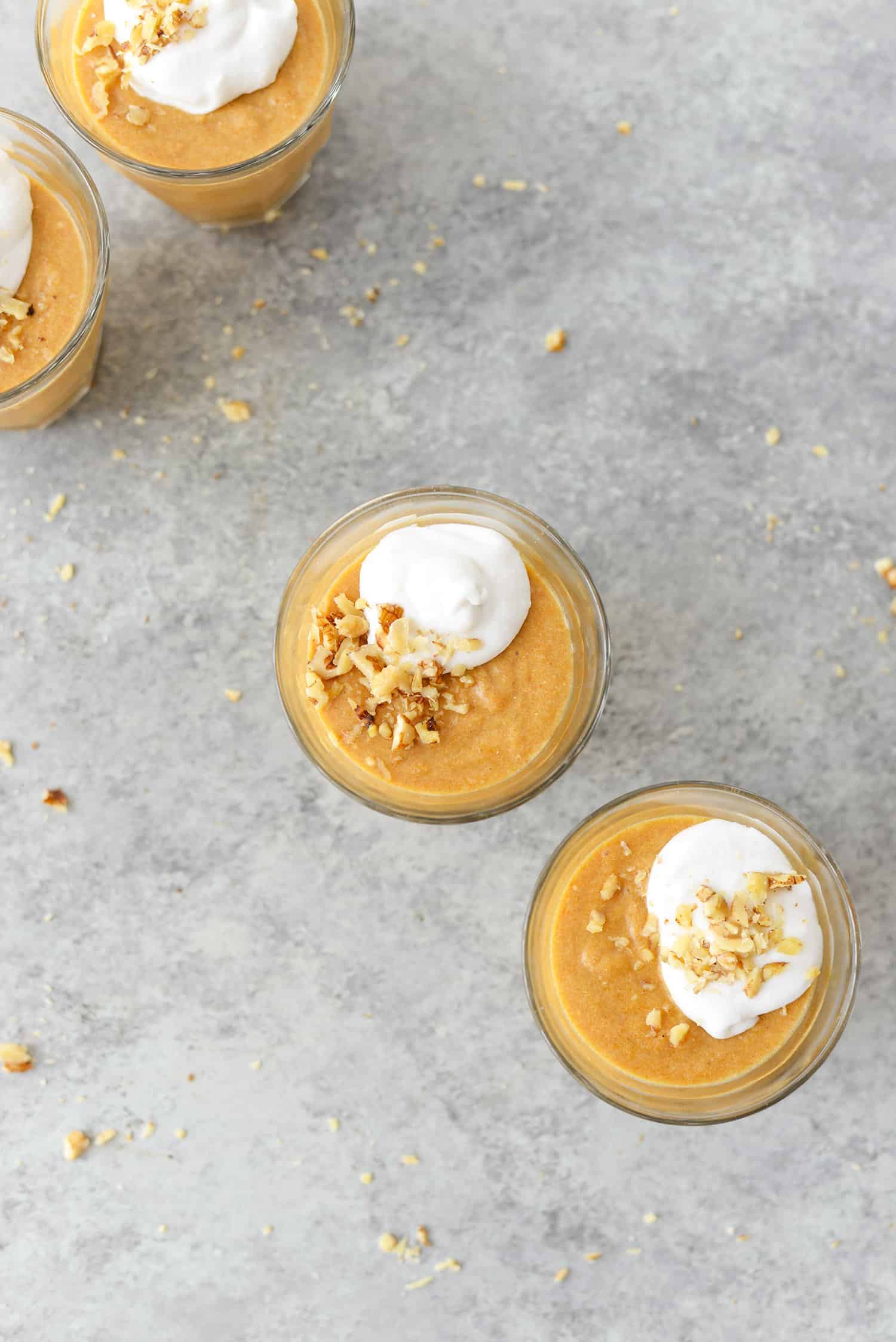 Vegan Pumpkin Pudding Cups! You've gotta try these pumpkin pudding cups made with aquafaba and coconut milk. Vegan and Gluten-Free, Naturally-Sweetened. | www.delishknowledge.com