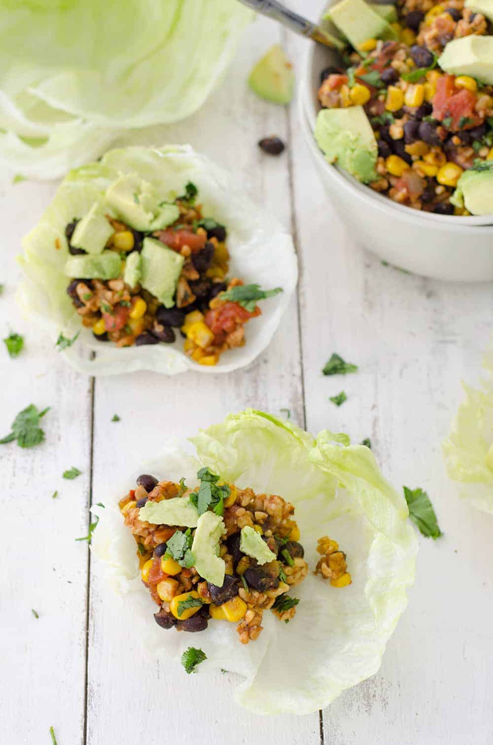 Vegan Taco Lettuce Wraps! High Protein, Lower Calorie Tacos! Spicy Tempeh And Black Bean Taco Meat Wrapped Inside Crispy Lettuce Leaves With Creamy Avocado. | Vegetarian, Vegan And Glutenfree | Www.delishknowledge.com