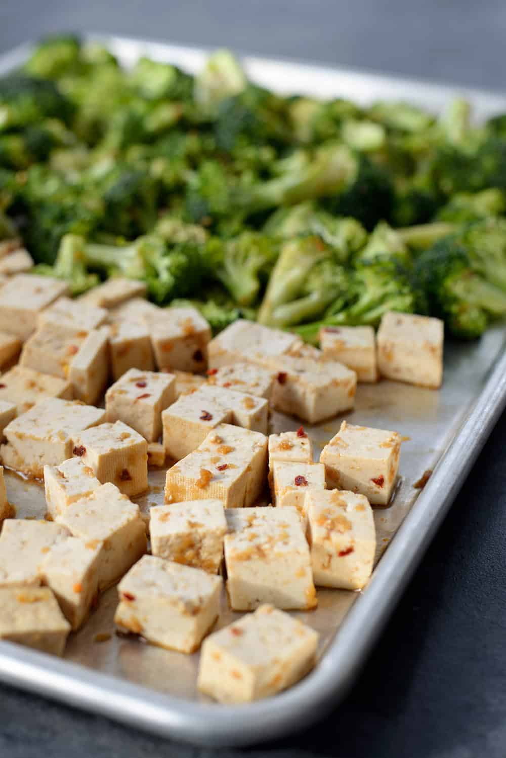 Sheet Pan Of Uncooked Tofu And Broccoli 