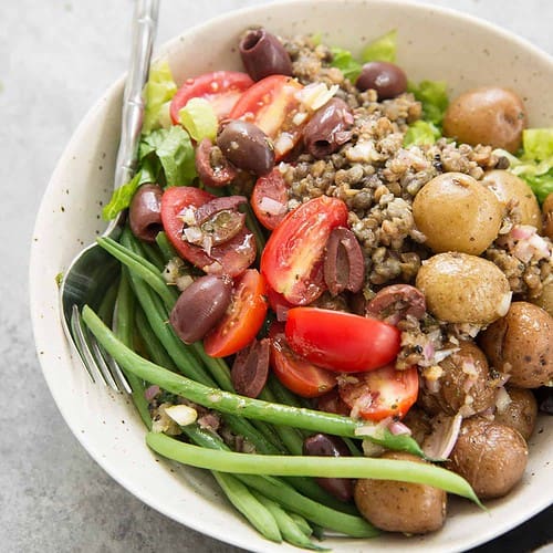 Lentil Nicoise Salad 9 Lentil Nicoise Salad! You Will Love This Protein Packed Plant-Based Meal. Potatoes, Vegetables, Seasoned Lentils, Green Beans And A Shallot Dressing. Gluten-Free And Vegan | Www.delishknowledge.com