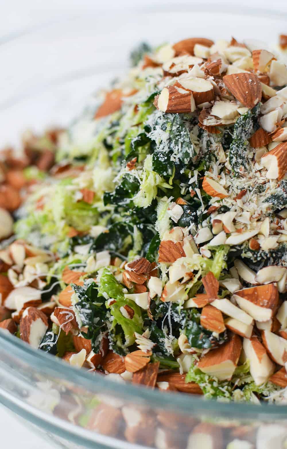 Shredded Brussels Sprouts Salad With Toasted Almonds And Grated Parmesan. The Best Salad, Perfect For Thanksgiving And The Holidays! You Must Make This One. | Www.delishknowledge.com