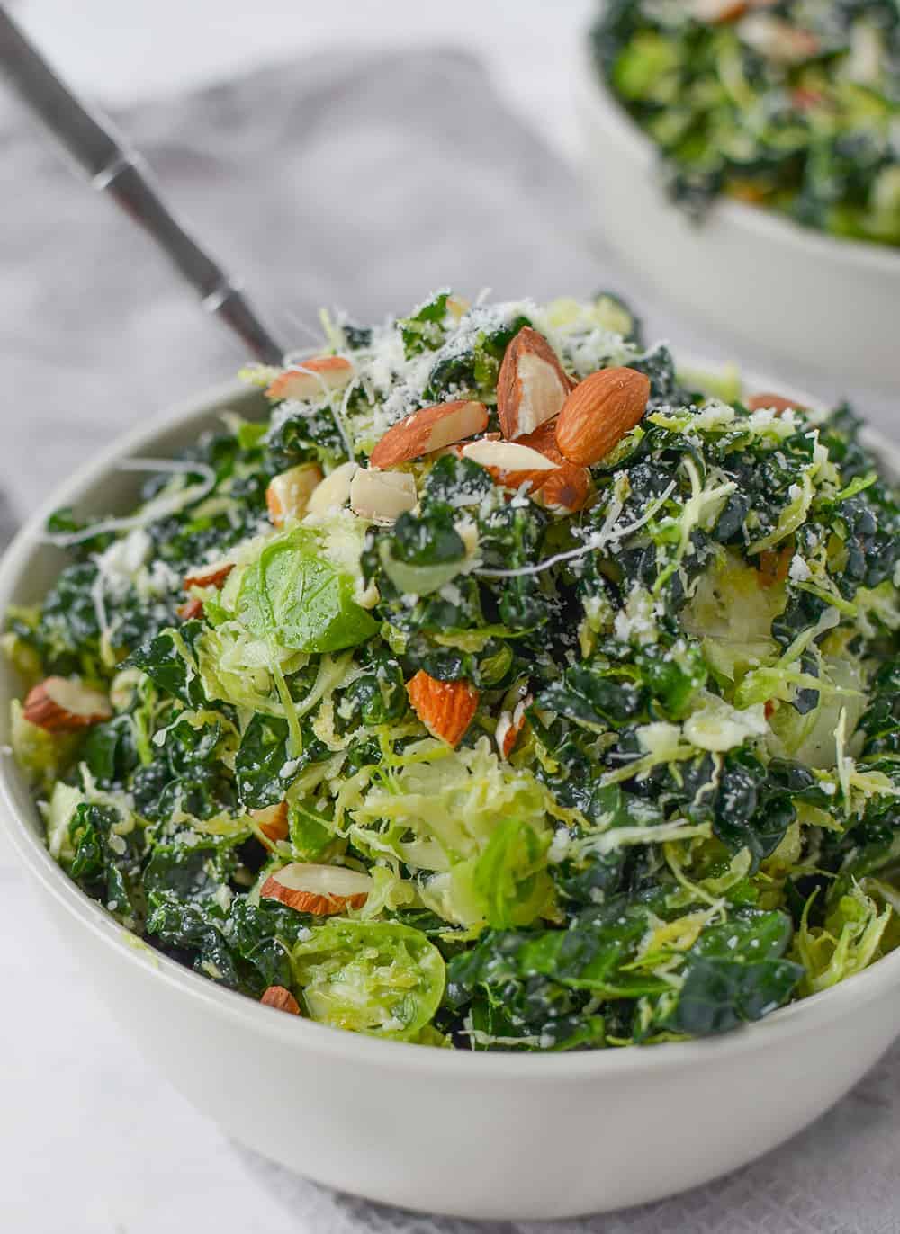 Shredded Brussels Sprouts Salad With Toasted Almonds And Grated Parmesan. The Best Salad, Perfect For Thanksgiving And The Holidays! You Must Make This One. | Www.delishknowledge.com