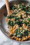 Warm Farro, Squash and Kale Salad with Orange-Miso Dressing! This vegan meal is super nourishing and healthy. Roasted squash sauteed with kale and farro, then tossed in a silky orange and miso dressing. A must make this winter! | www.delishknowledge.com