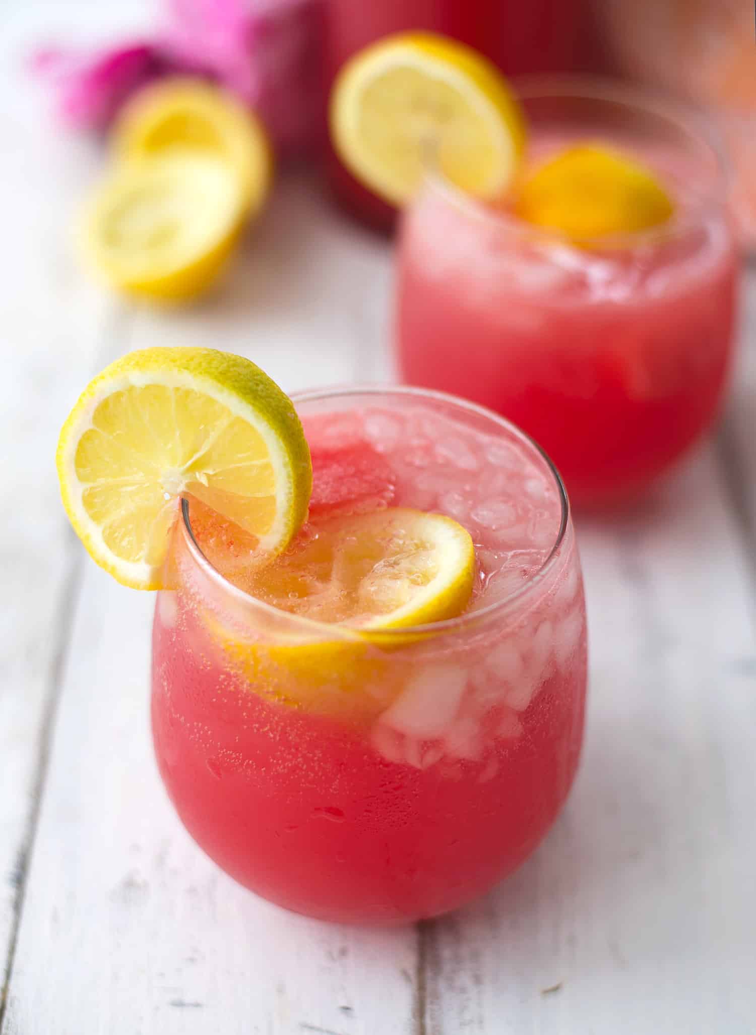 Serve garnished with freshly sliced lemon over ice