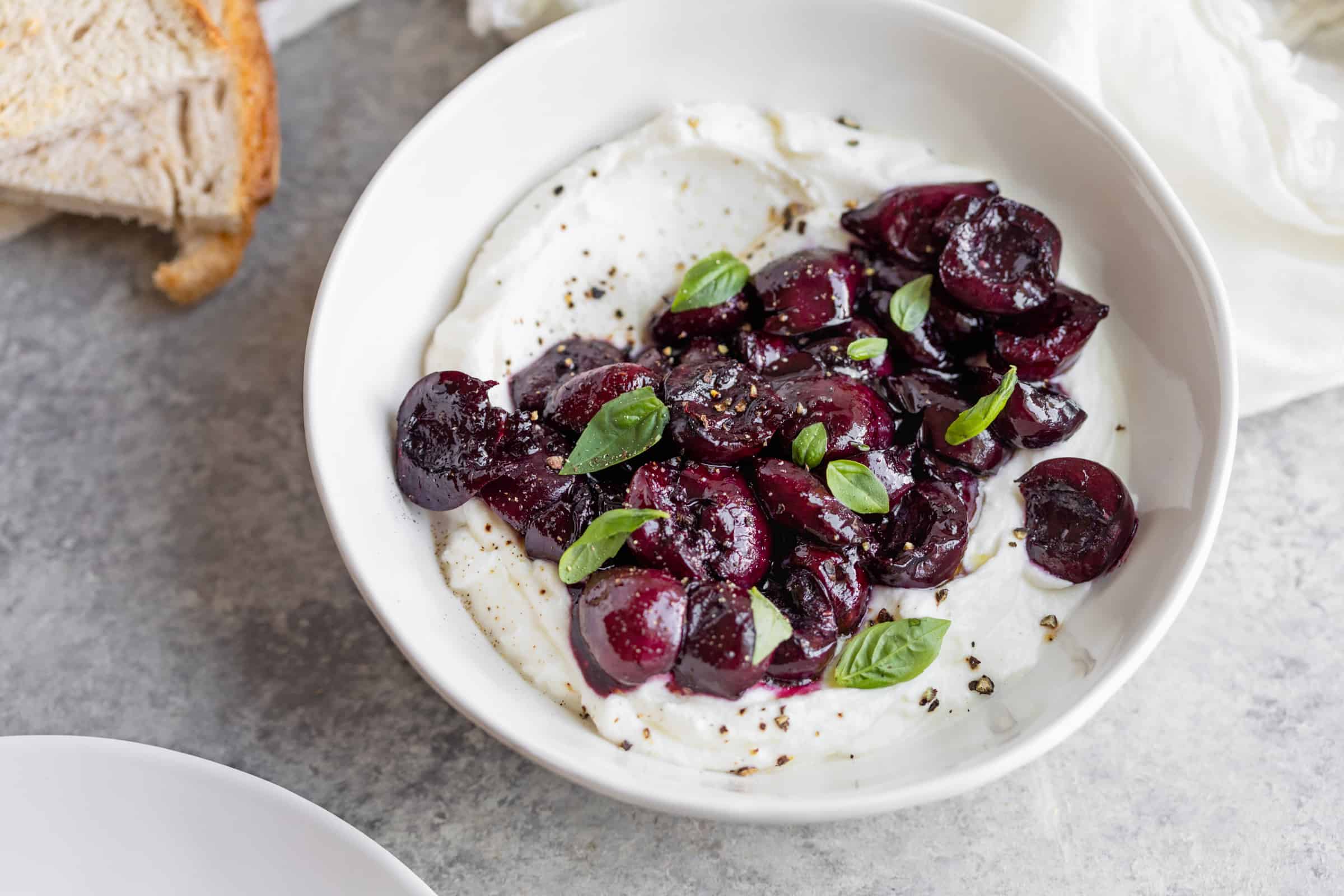 cherries on top of ricotta