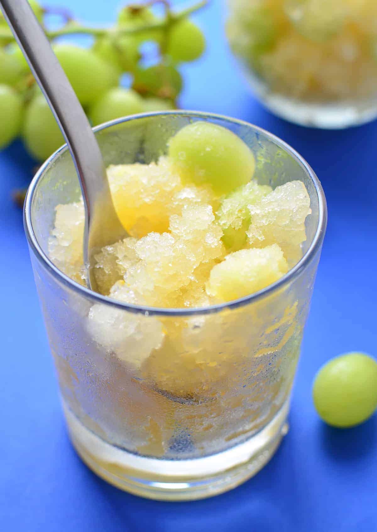 White Sangria Slush! One part sno-cone, one part healthy dessert. Serve this at your next cookout to please both the kids AND the adults. Vegan, Gluten-Free, Naturally sweetened. | www.delishknowledge.com