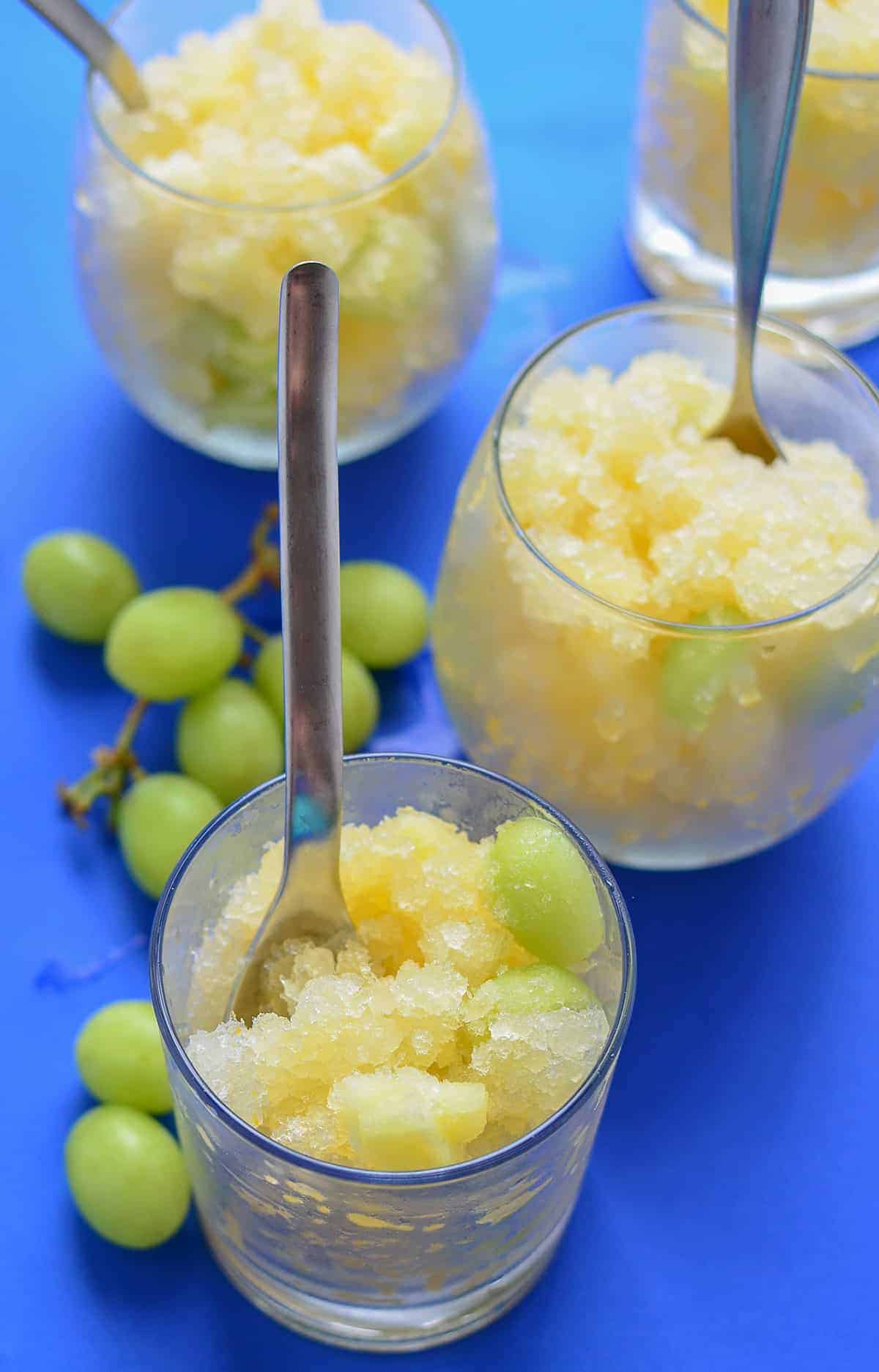 White Sangria Slush! One part sno-cone, one part healthy dessert. Serve this at your next cookout to please both the kids AND the adults. Vegan, Gluten-Free, Naturally sweetened. | www.delishknowledge.com