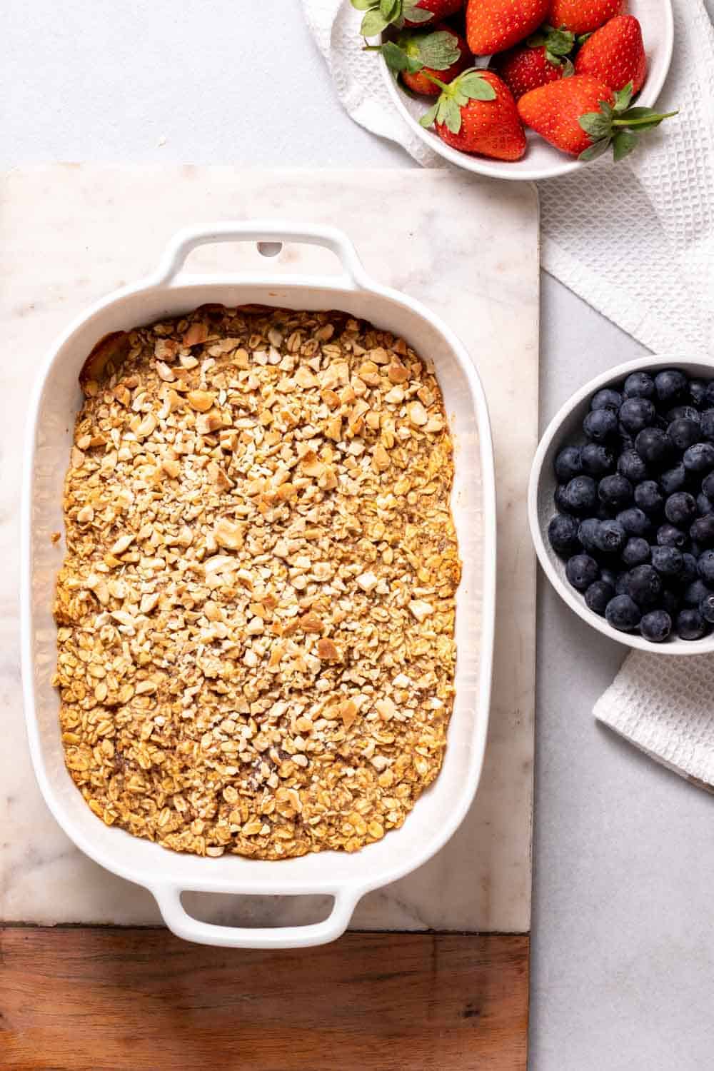 Cooked Oatmeal With Fresh Berries Around