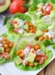 Buffalo Chickpea Lettuce Wraps! You are going to love these vegan and gluten-free wraps, ready in less than 20 minutes! #vegan #glutenfree #healthy | www.delishknowledge.com