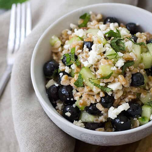 Blueberry And Farro Salad! This Sweet And Salty Salad Is Perfect For Summer Entertaining! Fresh Blueberries, Chewy Farro, Cucumber And Feta In A Lemon-Mint Dressing. Vegetarian | Www.delishknowledge.com