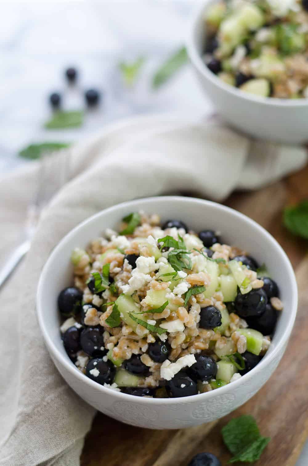 Blueberry And Farro Salad! This Sweet And Salty Salad Is Perfect For Summer Entertaining! Fresh Blueberries, Chewy Farro, Cucumber And Feta In A Lemon-Mint Dressing. Vegetarian | Www.delishknowledge.com