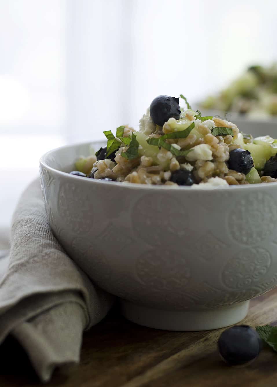 Blueberry And Farro Salad! This Sweet And Salty Salad Is Perfect For Summer Entertaining! Fresh Blueberries, Chewy Farro, Cucumber And Feta In A Lemon-Mint Dressing. Vegetarian | Www.delishknowledge.com