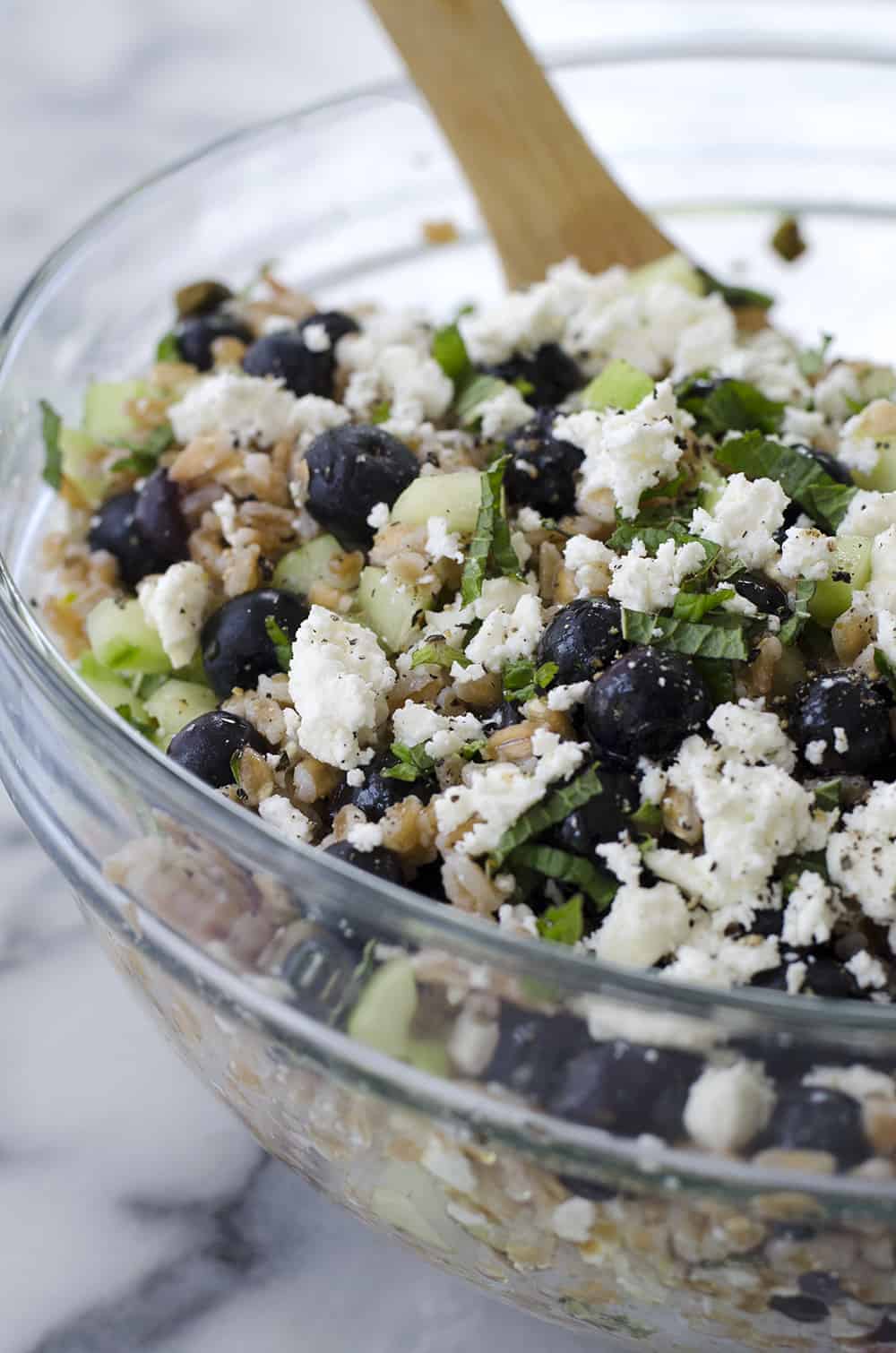 Blueberry And Farro Salad! This Sweet And Salty Salad Is Perfect For Summer Entertaining! Fresh Blueberries, Chewy Farro, Cucumber And Feta In A Lemon-Mint Dressing. Vegetarian | Www.delishknowledge.com