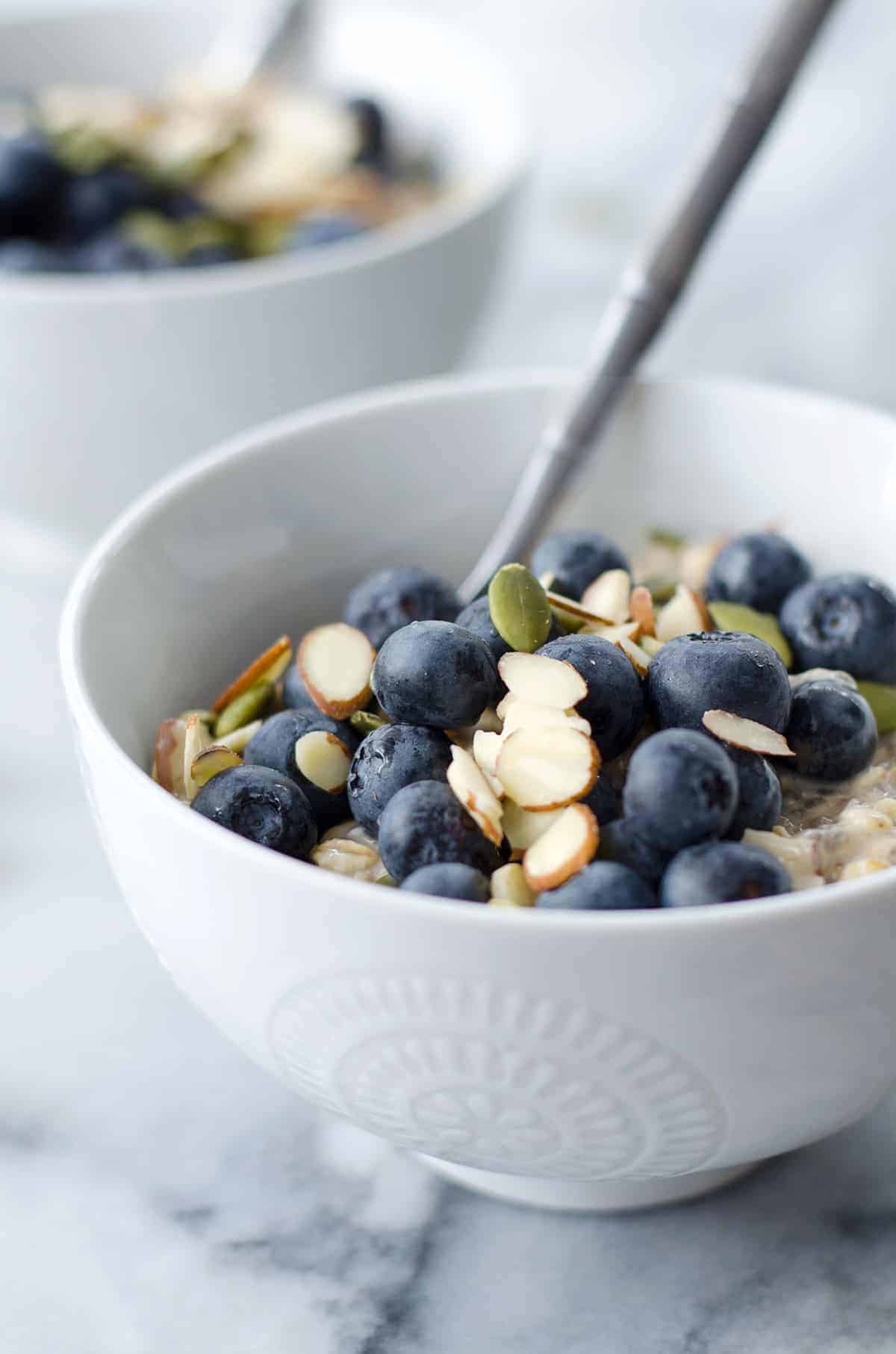 Blueberry Muesli In A White Bowl Ready To Eat