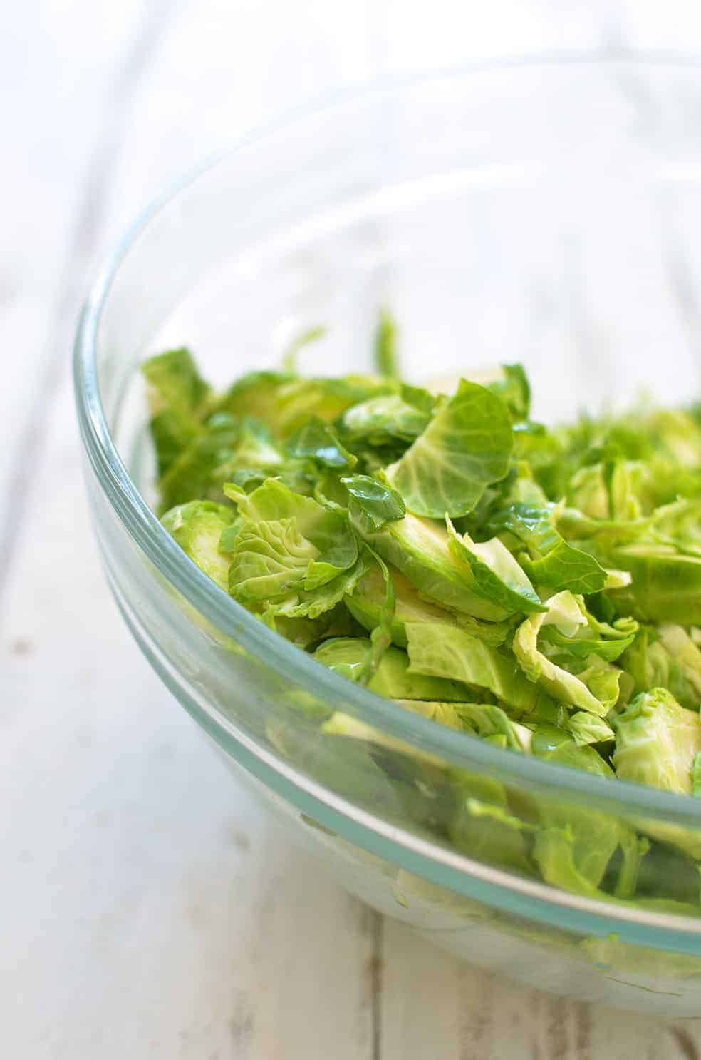 Brussels Sprout and Brown Butter Pasta! A must-make this holiday, so simple and delicious! Crispy brussels sprouts tossed with crunchy nuts, cheese, pasta and browned butter. | www.delishknowledge.com
