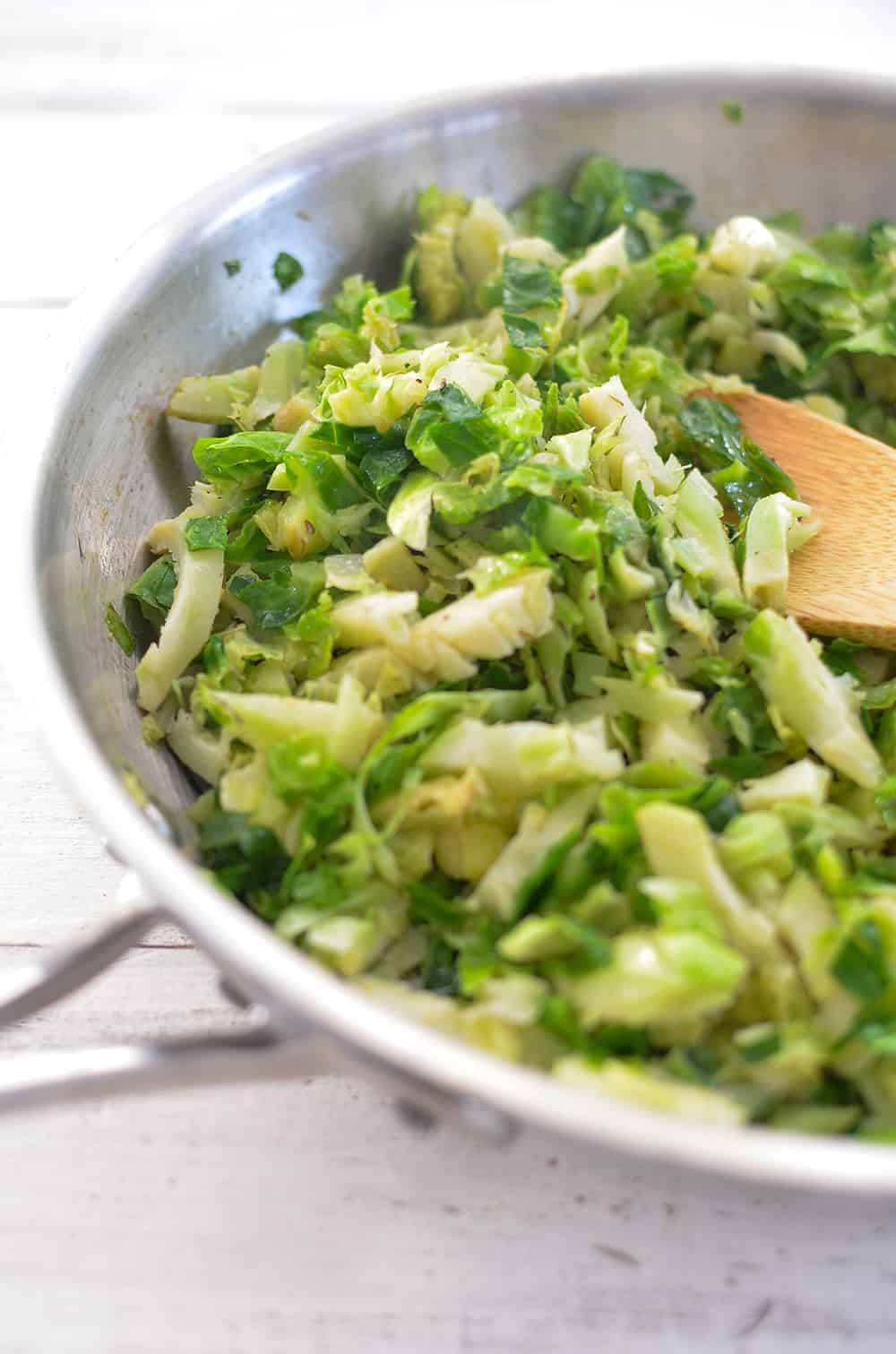 Brussels Sprout and Brown Butter Pasta! A must-make this holiday, so simple and delicious! Crispy brussels sprouts tossed with crunchy nuts, cheese, pasta and browned butter. | www.delishknowledge.com