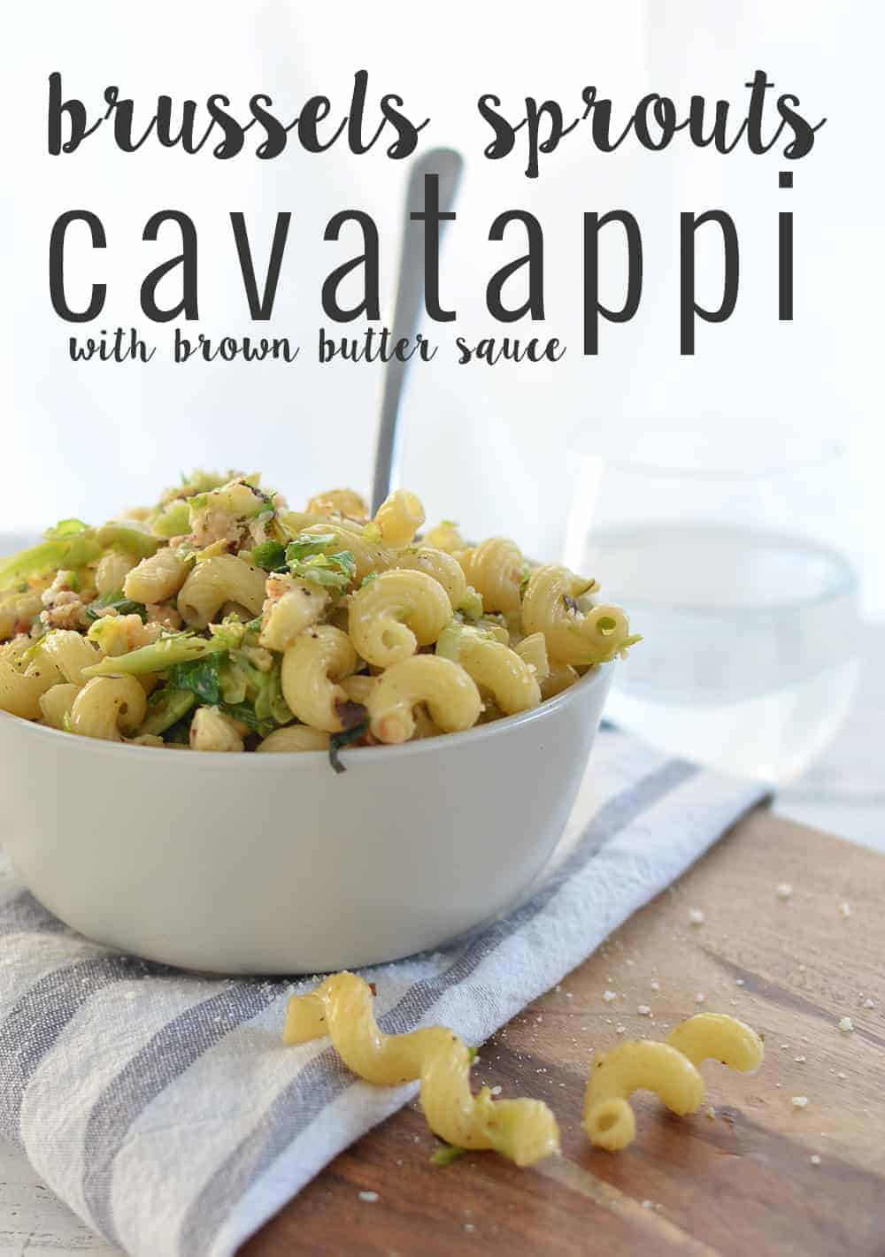 Brussels Sprout and Brown Butter Pasta! A must-make this holiday, so simple and delicious! Crispy brussels sprouts tossed with crunchy nuts, cheese, pasta and browned butter. | www.delishknowledge.com