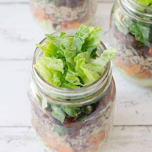 Burrito Bowl Mason Jars 7 Burrito Bar Mason Jar Salads! Layers Of Avocado Dressing, Roasted Sweet Potato, Quinoa, Black Bean And Crispy Lettuce. Vegan &Amp; Gluten-Free. | Www.delishknowledge.com