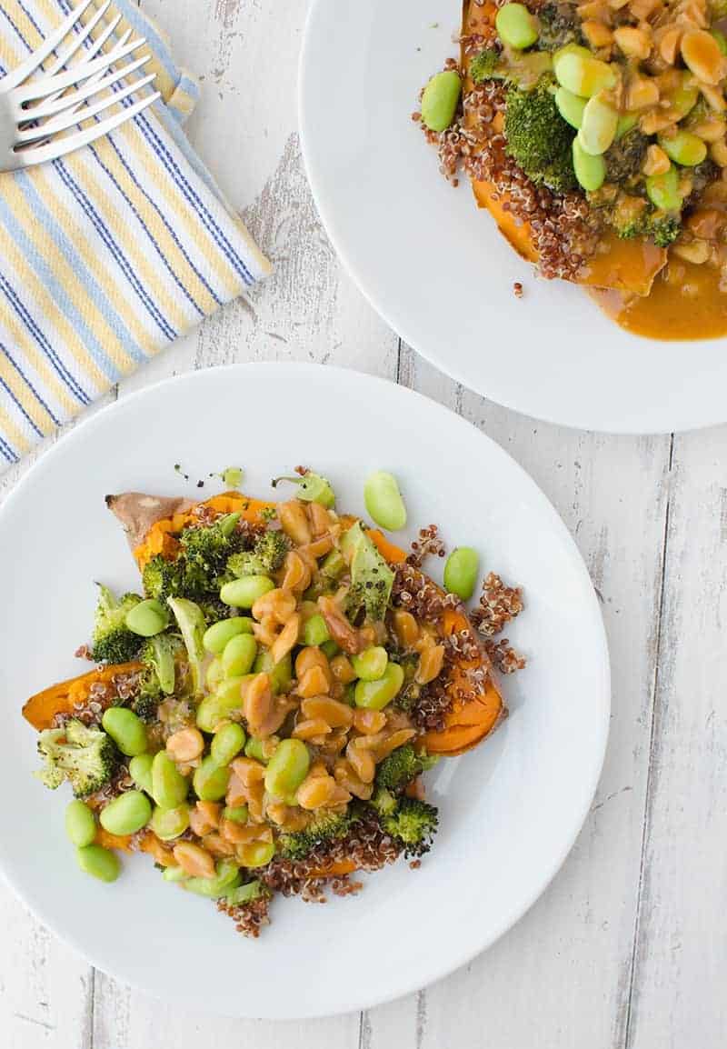 Curry Stuffed Sweet Potatoes! Such A Healthy And Delicious Meal! Baked Sweet Potatoes Topped With Quinoa, Broccoli, And Edamame. Topped With A Red Curry Peanut Sauce. 