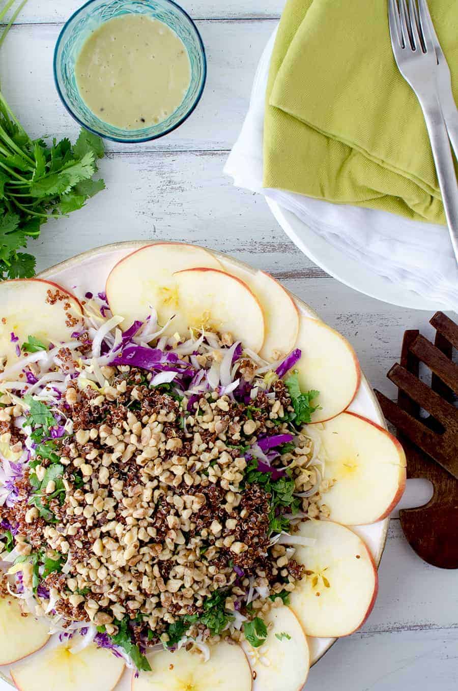 Winter Slaw! So, so good! Cabbage, Endive, Apples, Parsley, Walnut and Quinoa is a lemony-tahini sauce. Such a healthy side dish or main | www.delishknowledge.com 