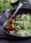 Vegetable Fajita Bowls with Creamy Cilantro Sauce! Roasted summer vegetables, cilantro rice, avocado and a creamy, dairy-free cilantro sauce. Vegan and Glutenfree | www.delishknowledge.com