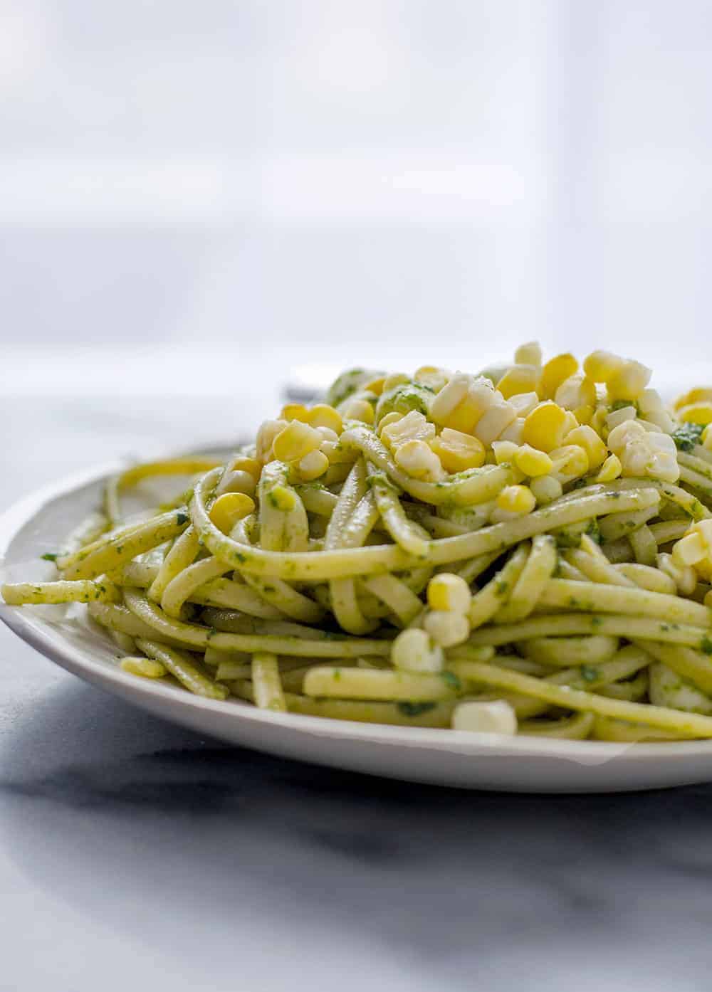 Fettuccini With Arugula Pesto And Sweet Corn- The Perfect Pasta For Summer! Ready In Just 20 Minutes! Vegetarian, Easily Vegan. | Www.delishknowledge.com 