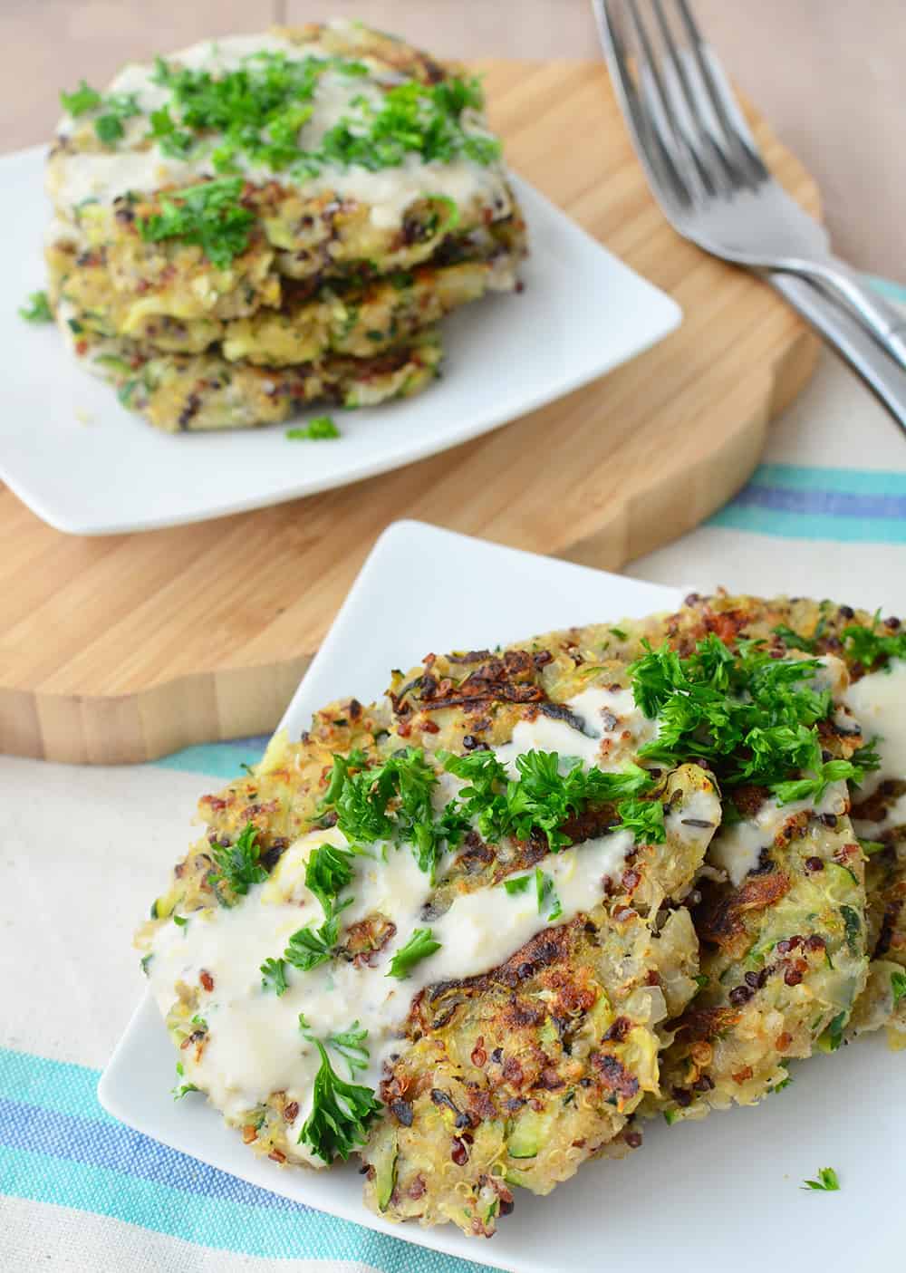  Quinoa Zucchini Fritters Drizzled With Hummus Sauce 