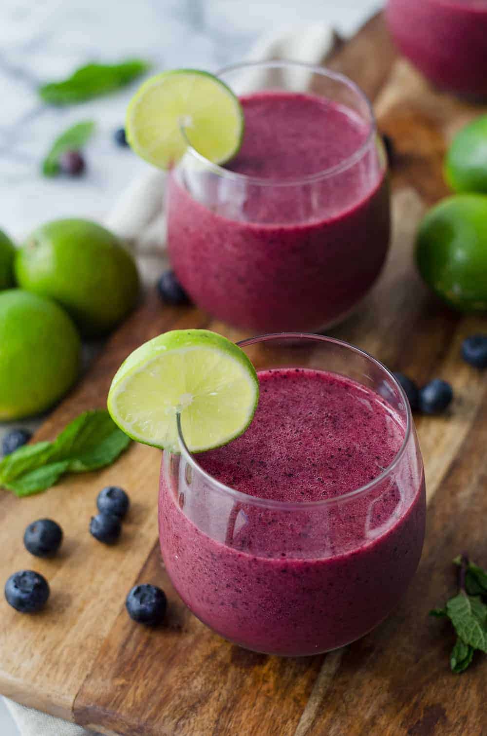 Frozen Blueberry Mojito Recipe! The Perfect Drink For Summer! Blueberries, Mint, Lime And Rum Pureed Until Frosty And Thick! | Www.delishknowledge.com