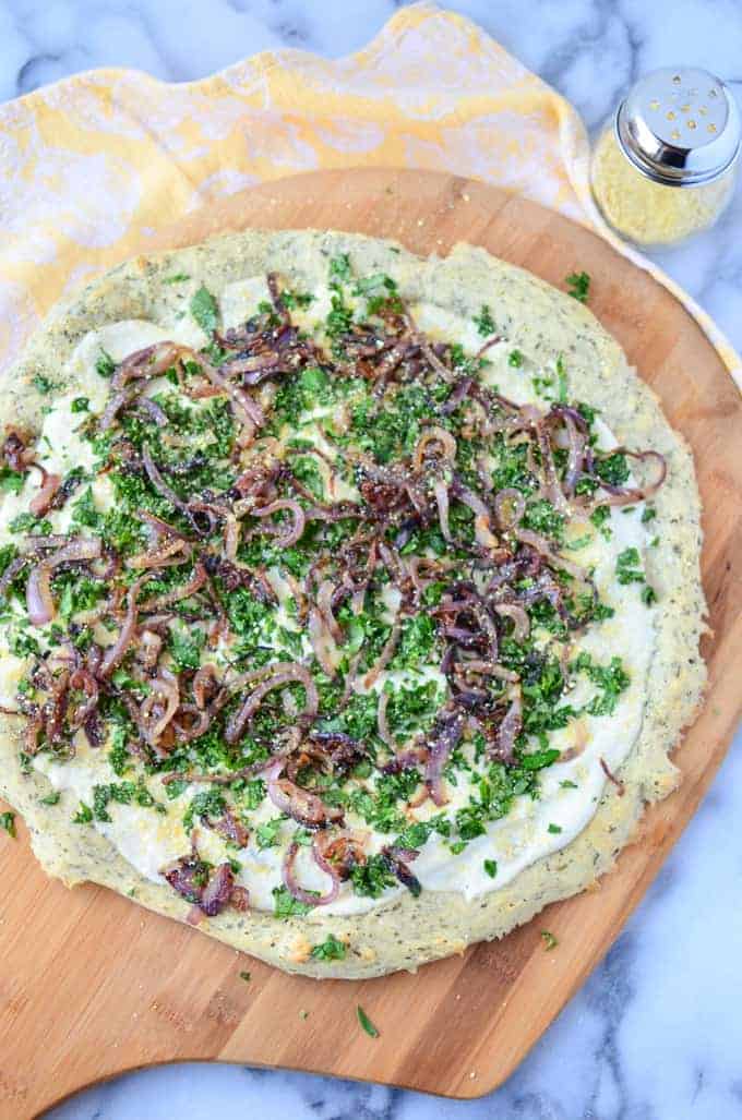 https://www.delishknowledge.com/wp-content/uploads/garlic-white-pizza-vegan-1-1-of-1.jpg